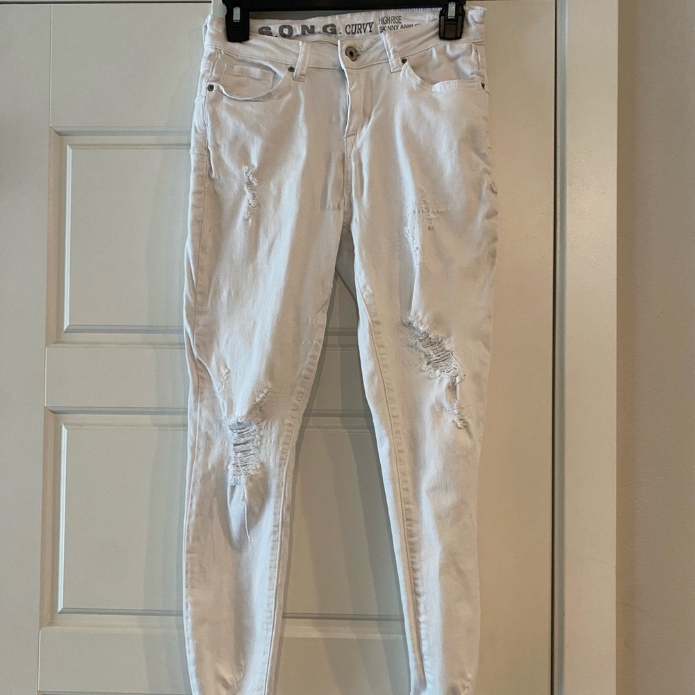 Super stretchy white, distressed skinny jeans high-rise